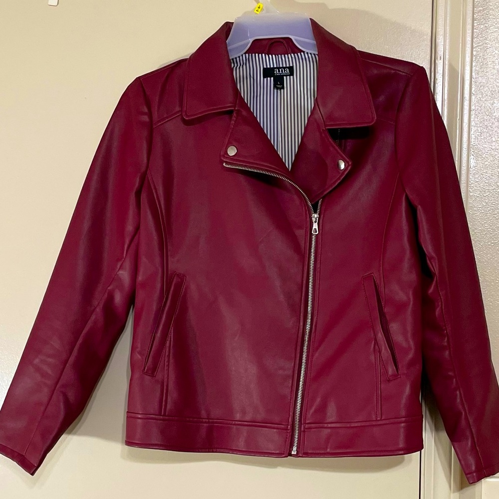 Just as described. Wine/burgundy color leather jacket